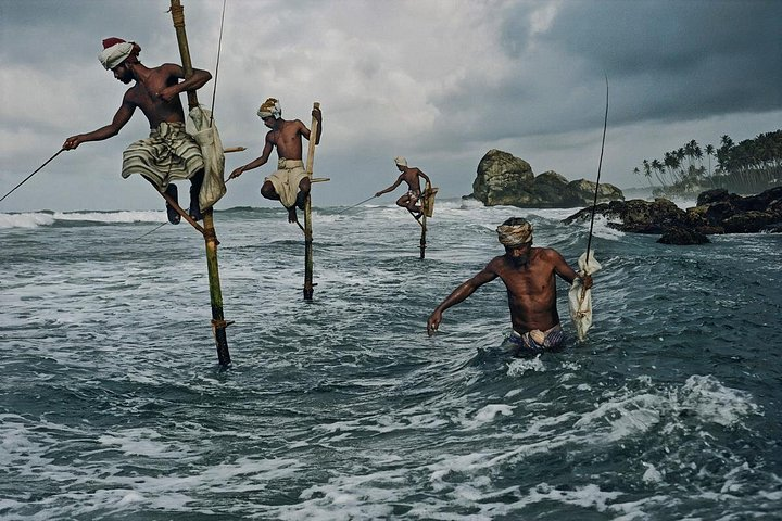 Stilt fishing at city on the southwest coast of Sri Lanka